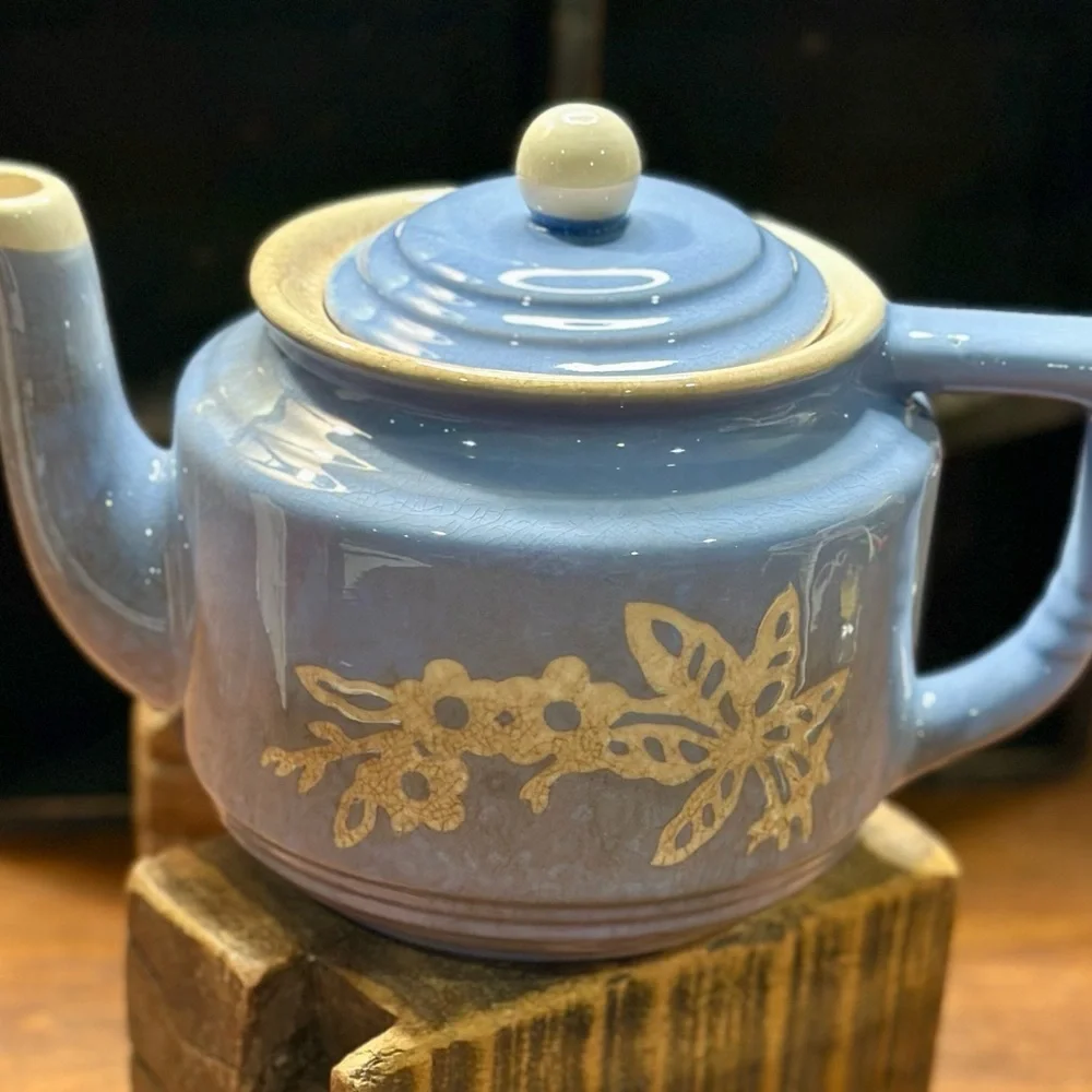 Vintage Blue Ceramic Teapot with Floral Design and Lid